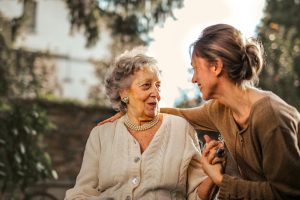 pexels-olly-3768131 daughter greeting senior mother