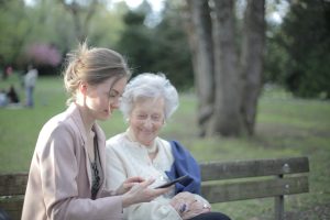 pexels-olly-3791666 caregiver with an elderly woman